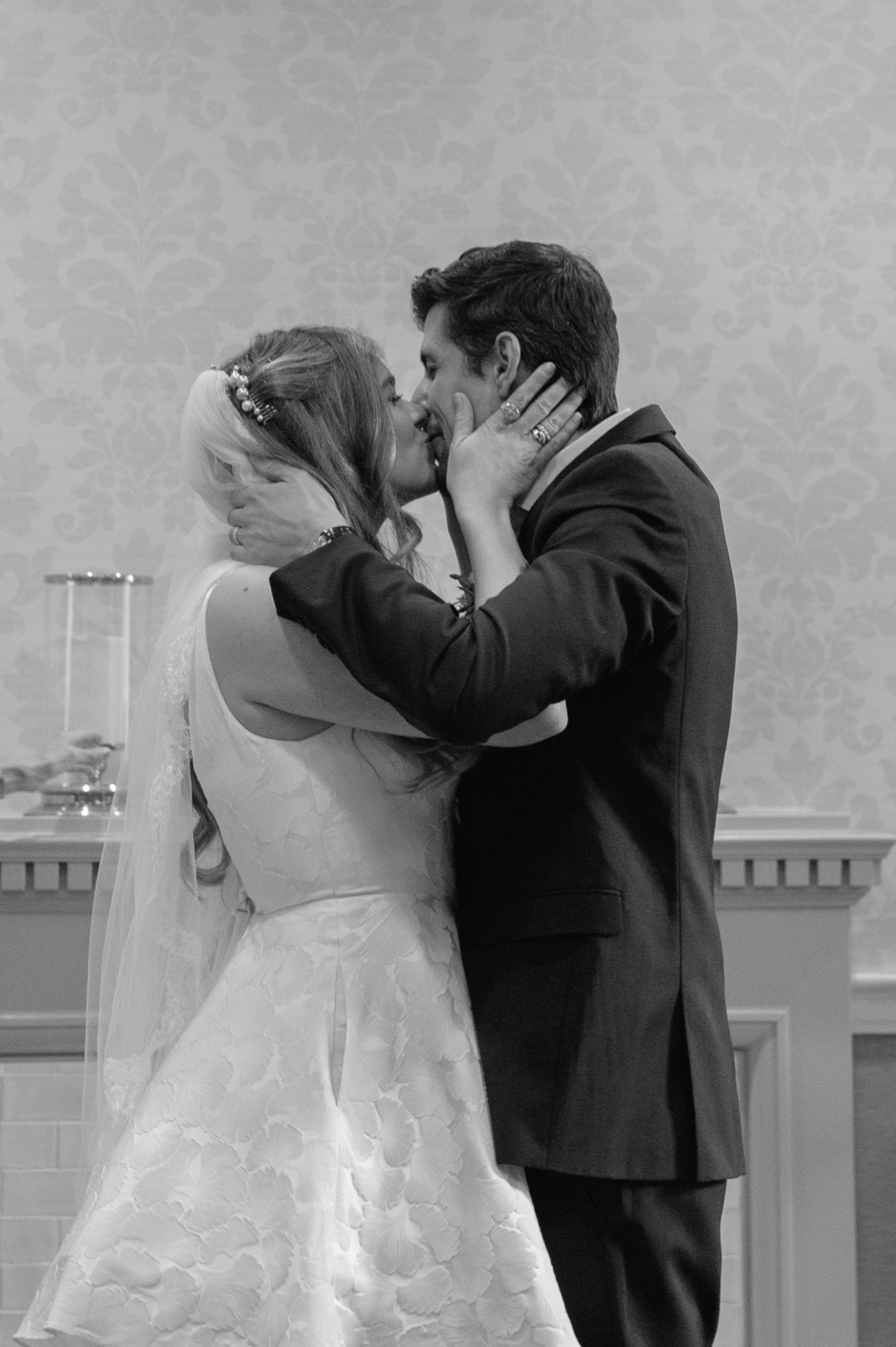 Ivan and Nandi kissing after their ceremony